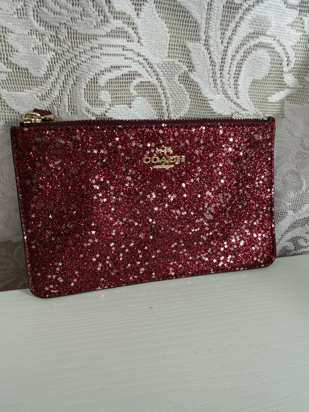 Coach maroon burgundy Glitter Star Wristlet Zip Pouch with Gold Logo